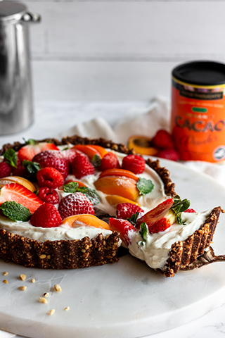 Slice of No Bake Breakfast Tart combining fruit, yoghurt and a crunchy crust