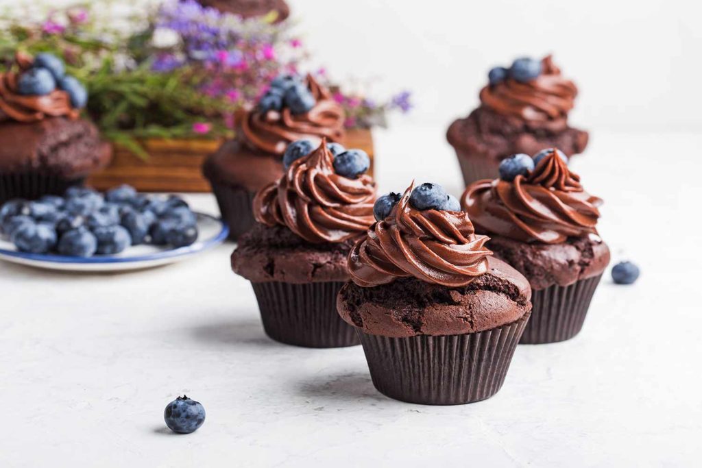 Chocolate Cupcakes with Whipped Chocolate Ganache topped with blueberries