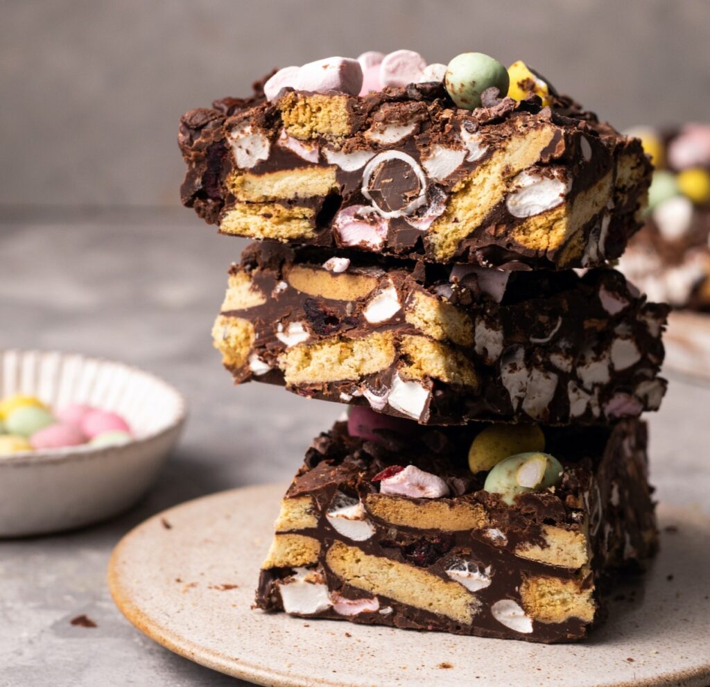 Easter Rocky road squares stacked on a plate