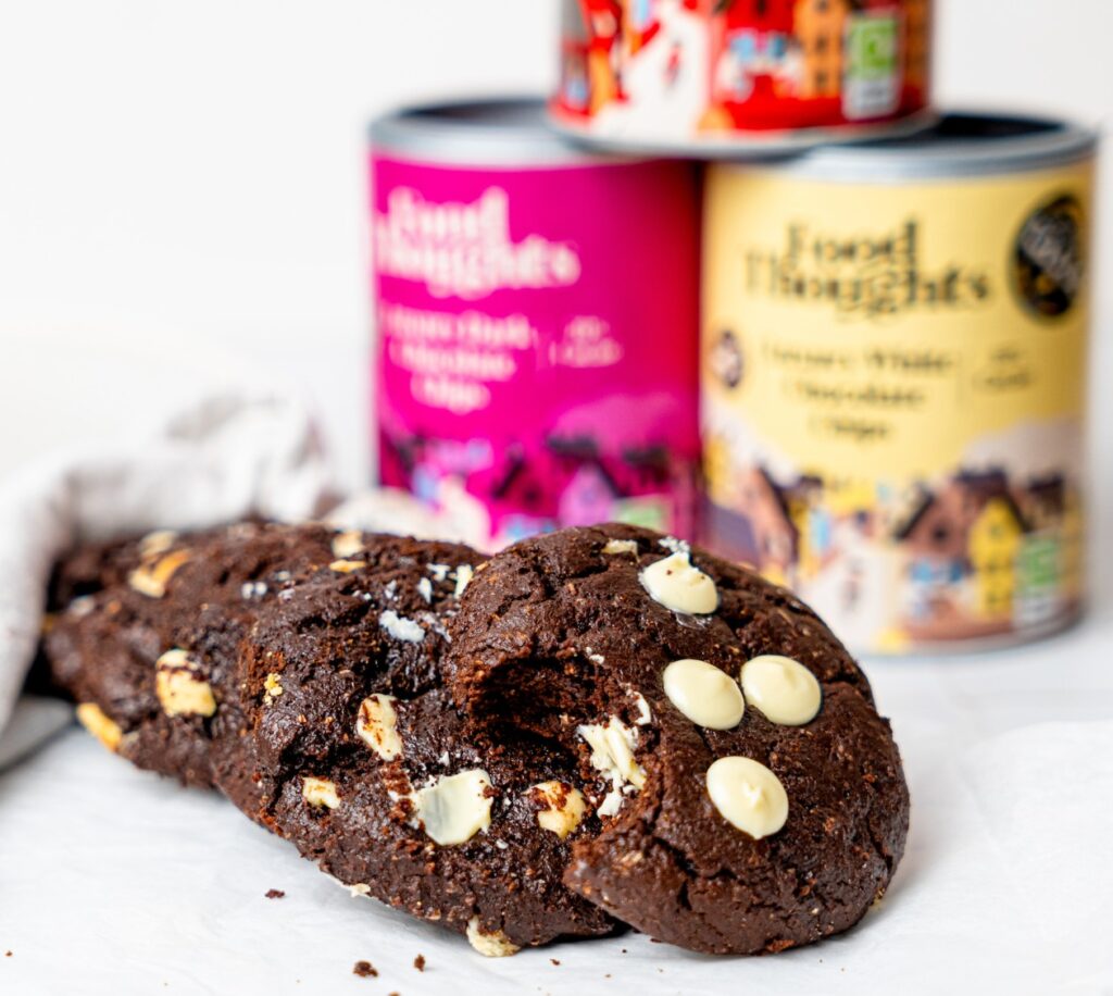 chocolate brownie cookies in front of food thoughts tubs
