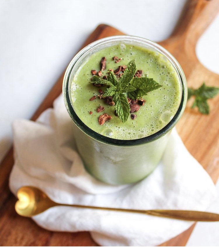 mint choc chip banana smoothie in a glass