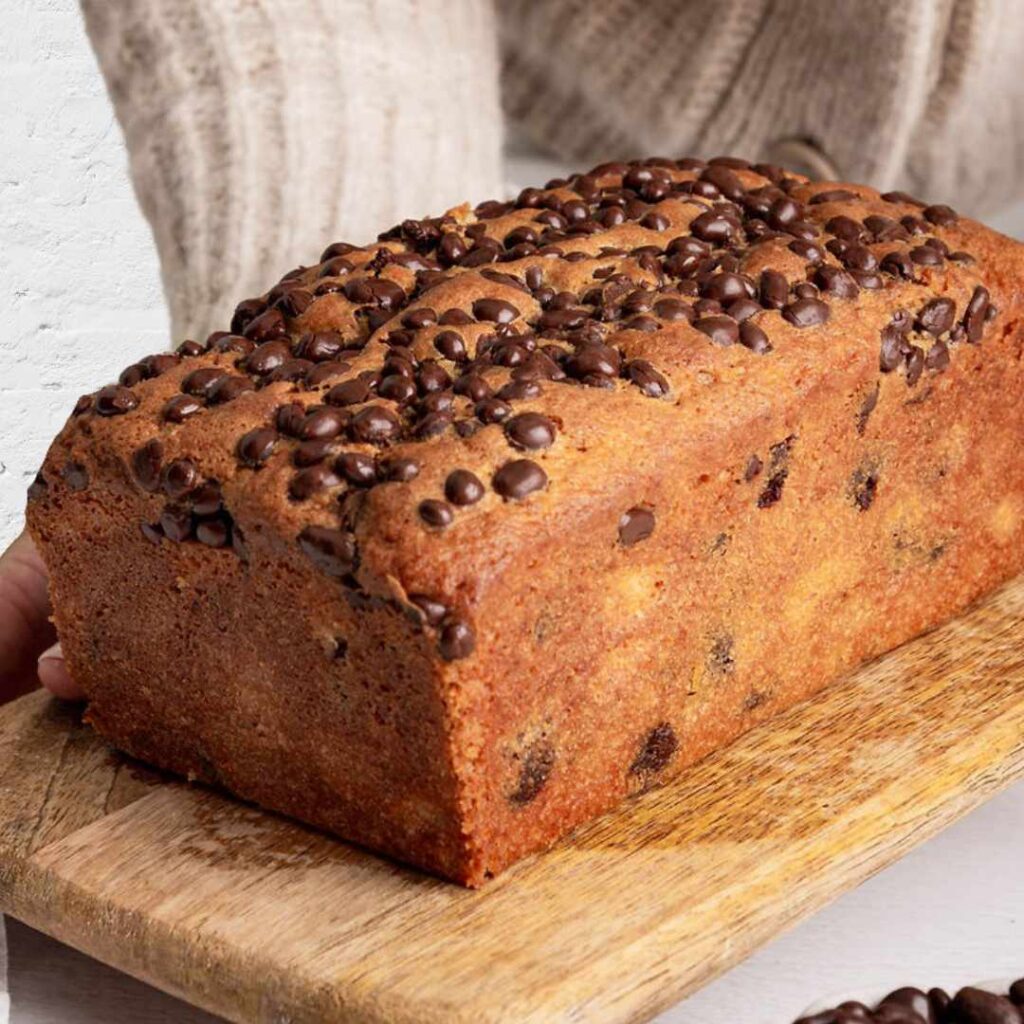 Chocolate chip banana bread load on a wooden board