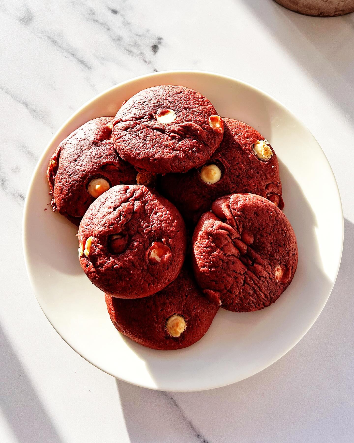Officially allowed to talk about the V-day and to dream of these red velvet and white chocolate cookies. So tasty, that we’ve actually gone ahead and baked some using our Organic Cocoa Powder (on offer at the mo at @sainsburys ). Happy Friday.