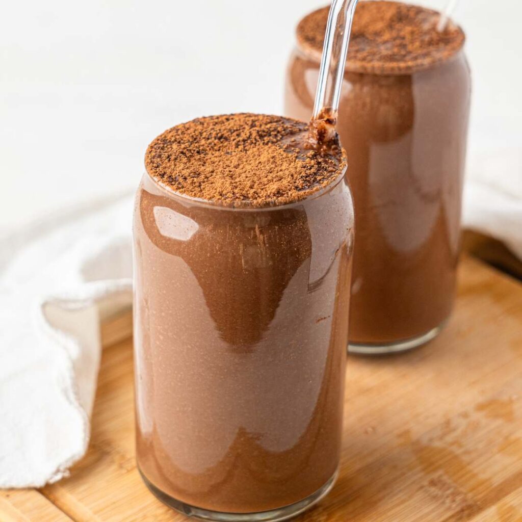 2 glasses filled with caramel chocolate smoothie and looking delicious.