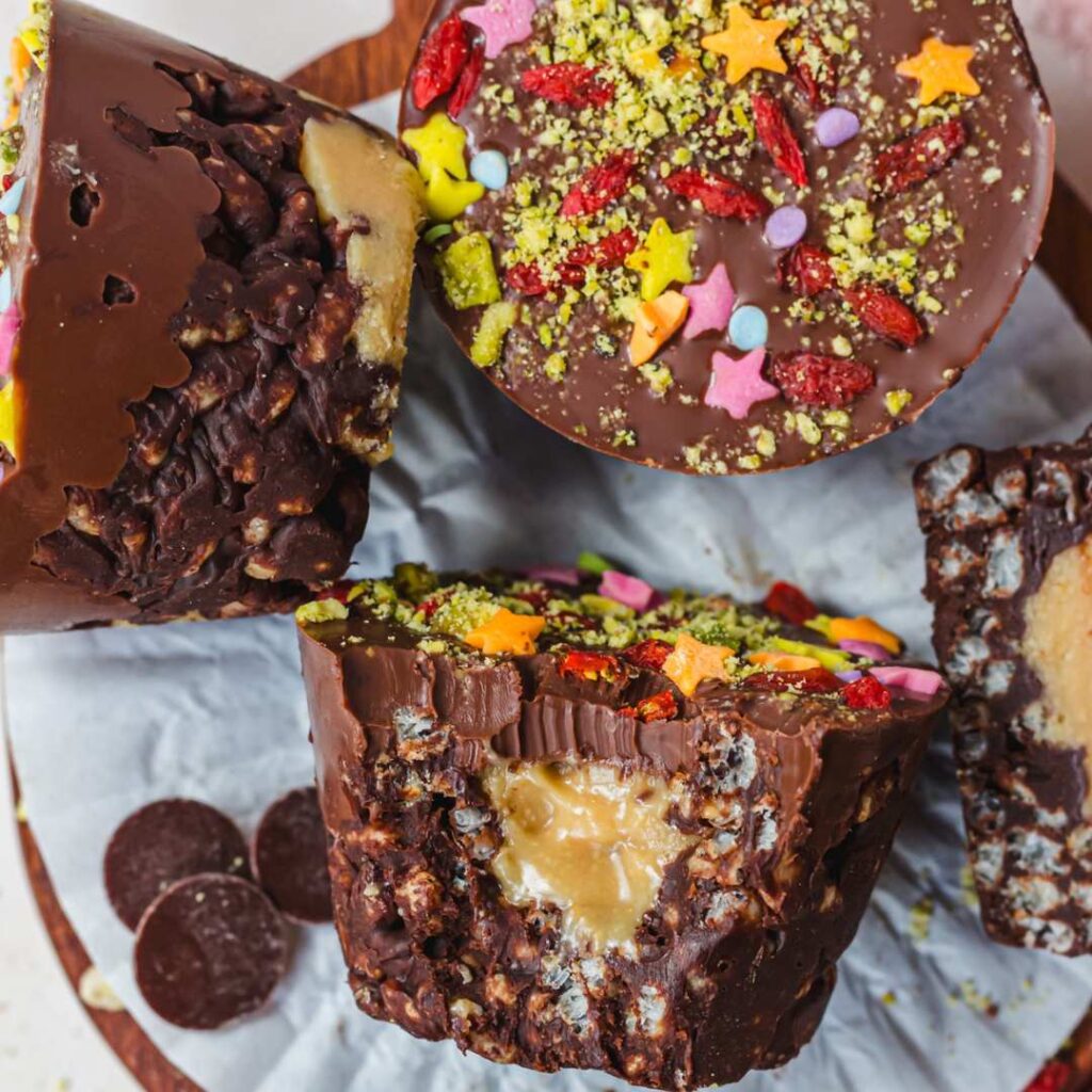 close up of festive decorated caramel and chocolate rice crisply cake cups